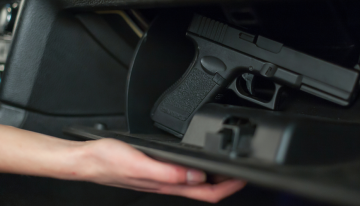 Death match: Man with pistol vs. work truck