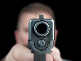 Man dodges headshot from large caliber pistol